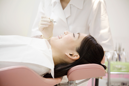 Japanese,Woman,Receiving,Dental,Treatment